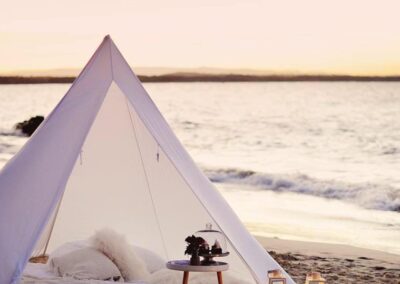 A teepee on the beach for an intimate gathering for the bride and groom in Los Cabos.